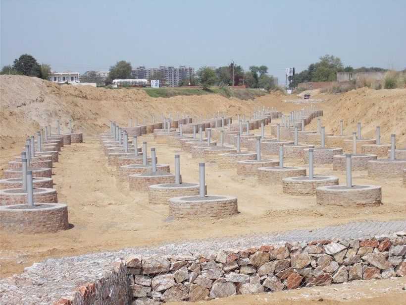 Rows of brick-lined recharge shafts in a recharge trench